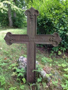 Kāroņu kapsēta Logo