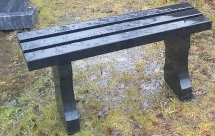 Granite bench with decorative cut legs