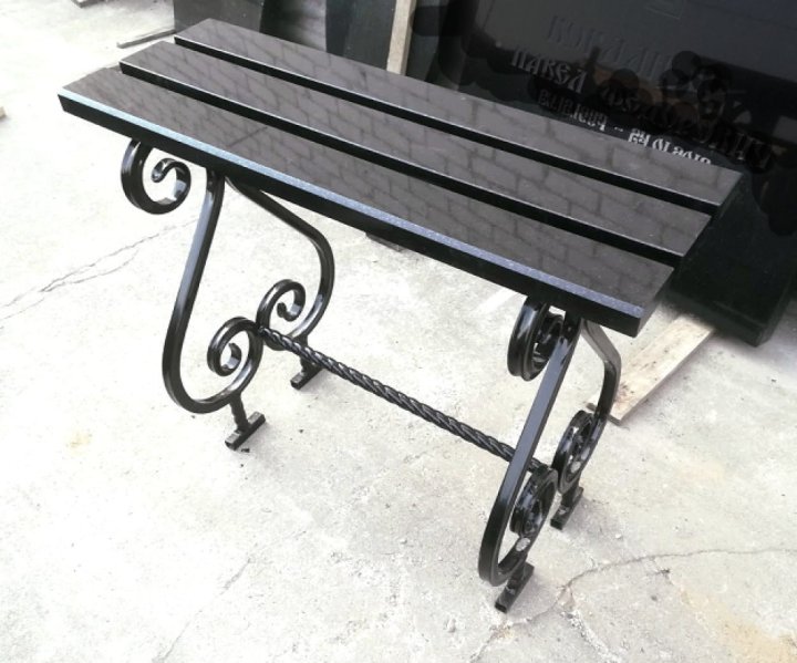Grave bench with metal legs and granite surface