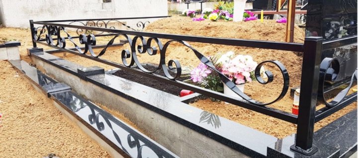 Metal fencing for the grave site
