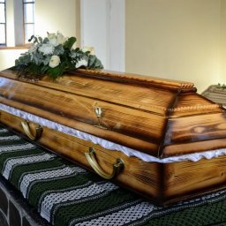 Preview image for  Деревянный гроб с траурным букетом