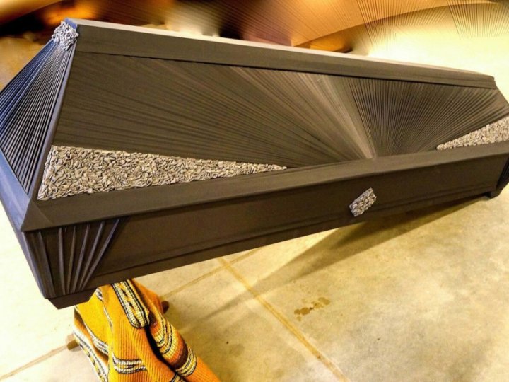 Draped wooden coffin