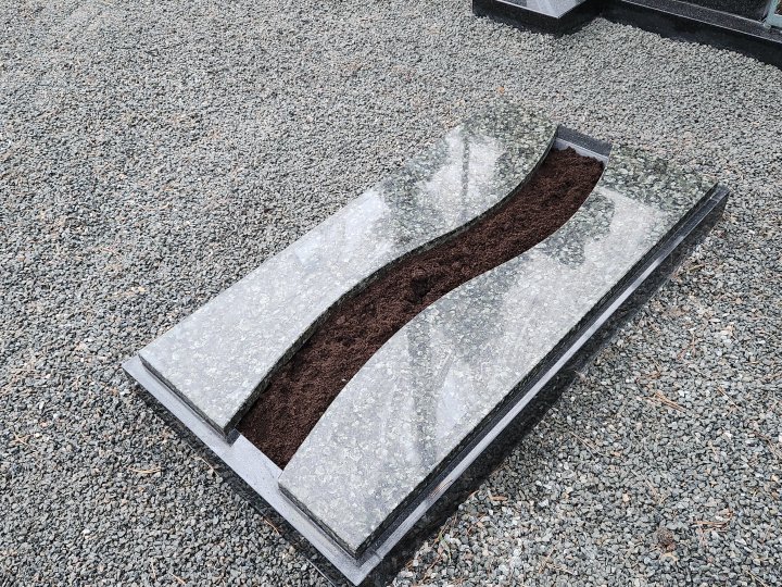 Semi-closed granite tombstone