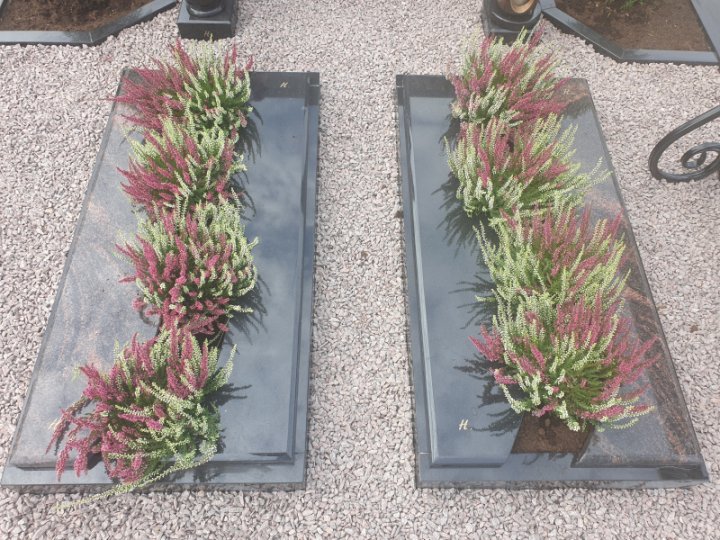 Granite gravestone with partially closed surface