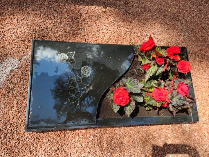 Semi-closed granite tombstone