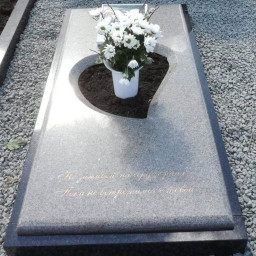Preview image for  Granite gravestone with a heart-shaped cutout 
