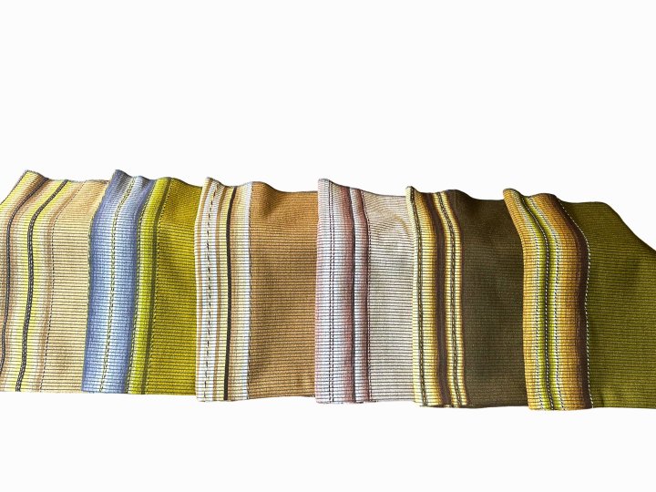 A variety of traditional blankets for coffins