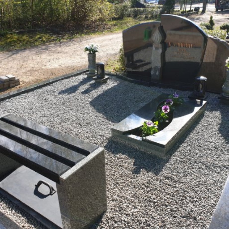 Granite gravestone with partially closed surface