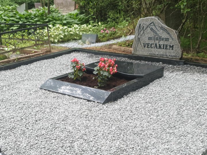 Granite gravestone with a beveled front edge for inscription