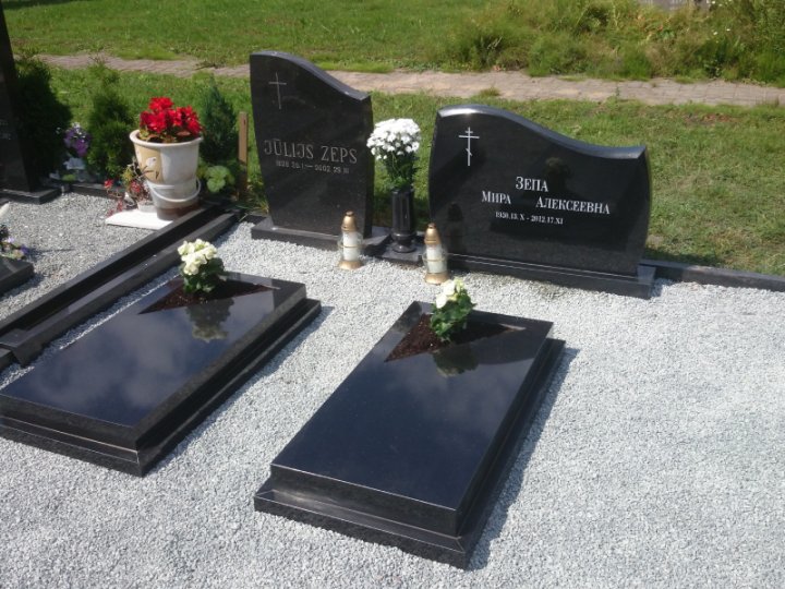 Granite graves slab with an open corner