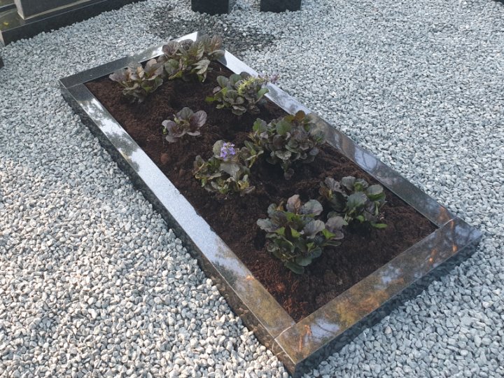 Elegant granite open gravestone