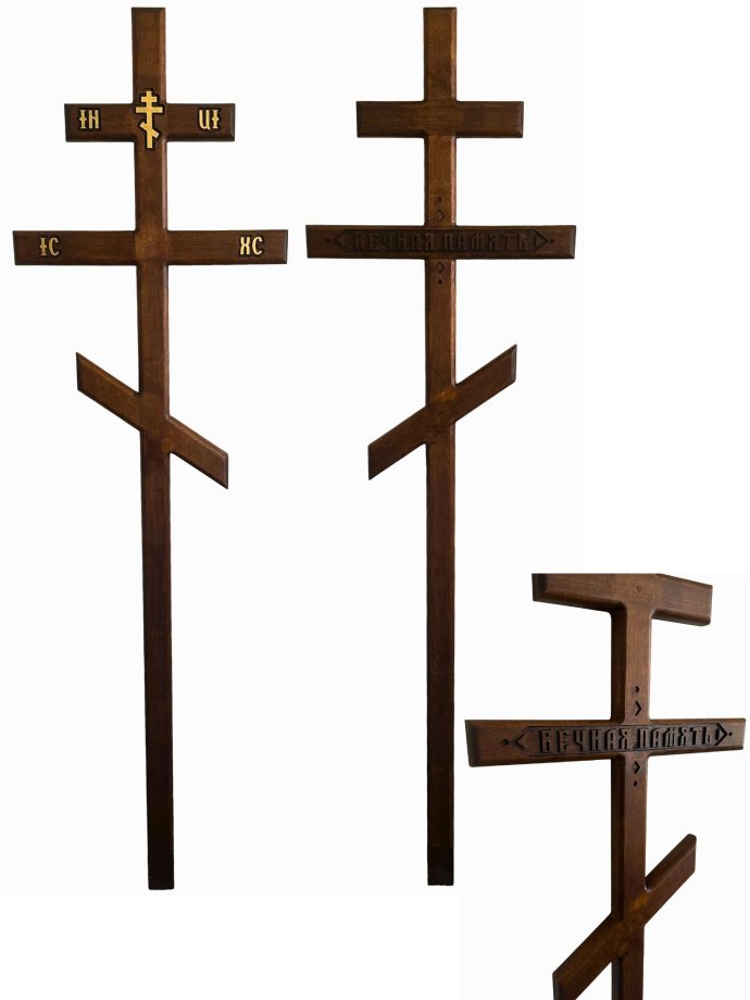 Dark Orthodox wooden cross with engraving in Agenskalns