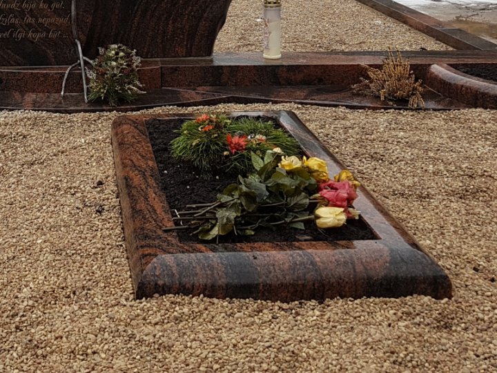 Elegant granite open gravestone