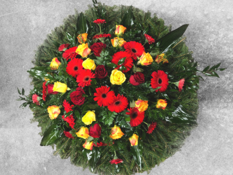 Funeral wreath, 90 cm in diameter, made from vibrant freshly cut flowers