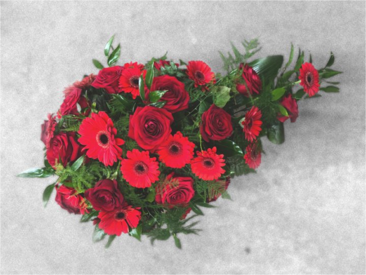 Funeral spray with red flowers for a beautiful farewell ceremony
