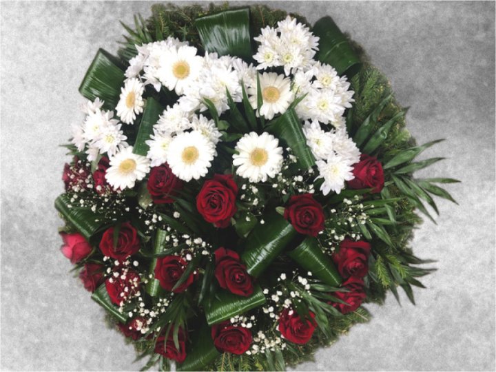 Funeral wreath with white and red flowers