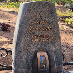 Preview image for  Granite tombstone with an integrated candle holder