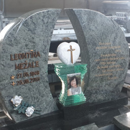 Preview image for  A granite gravestone made of two parts, resembling wings