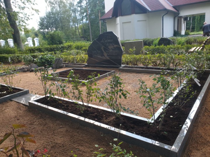 Granite funerary monument with an asymmetrical shape