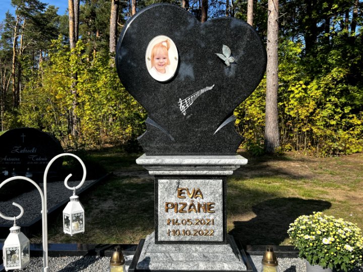 Exclusive monument with heart on elegant pedestal