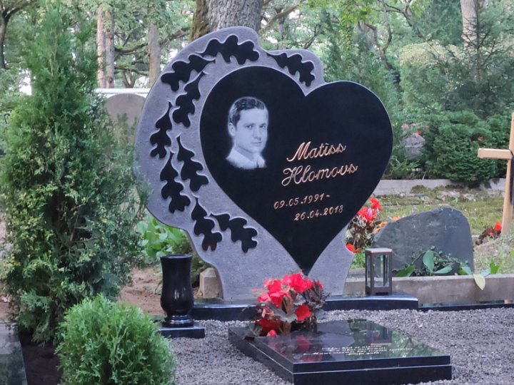 Granite gravestone in the shape of a heart